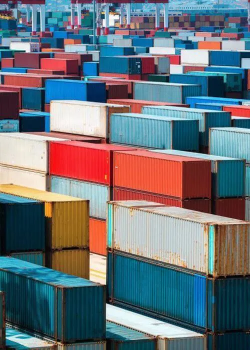 photodune Zqkbx6ro lots of cargo freight containers scaled 1